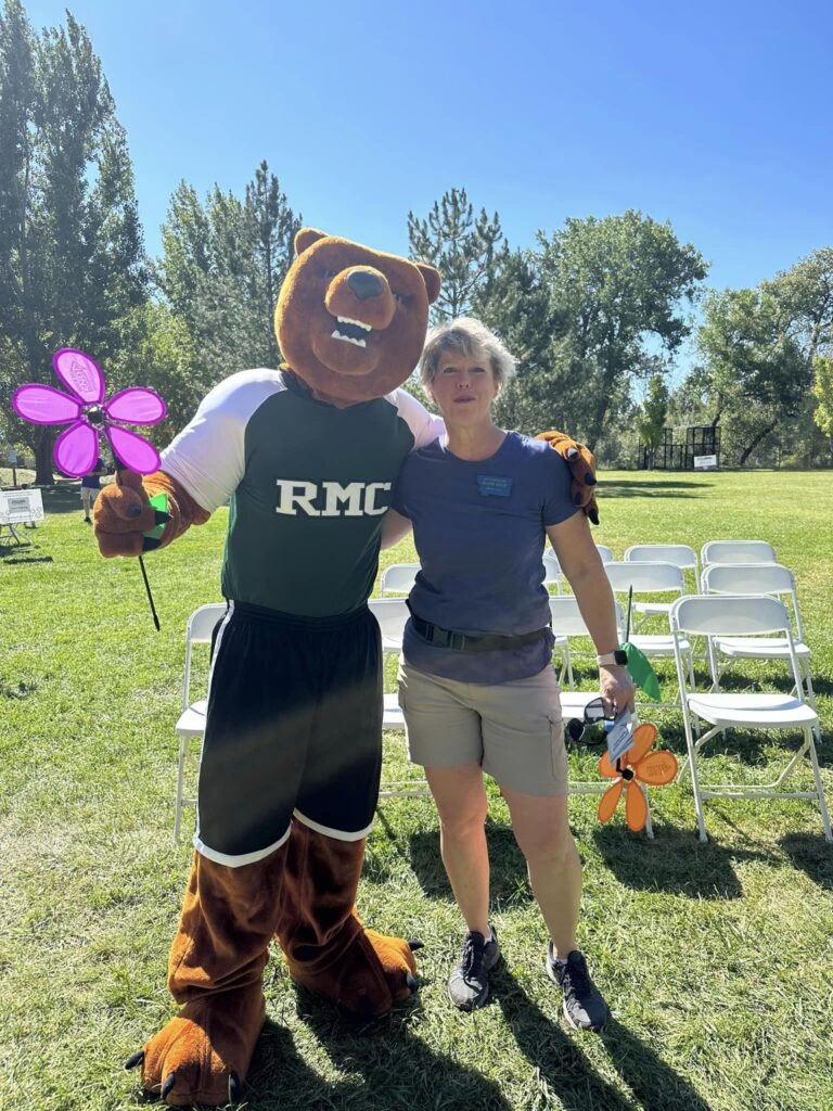 Denise at the Walk to End Alzheimer's with the Rocky Mountain College Bear